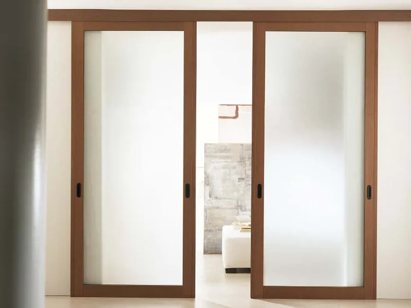 Porte scorrevoli vetro e legno Pareti scorrevoli in vetro per interni