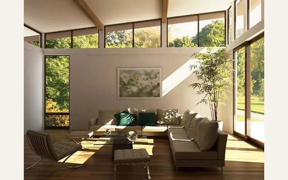 Zona living in beige con dettagli in verde