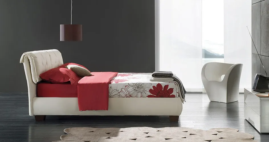 parete grigia in camera da letto con letto Magic One
