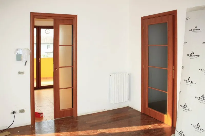 Porte a scrigno prezzi legno e pvc