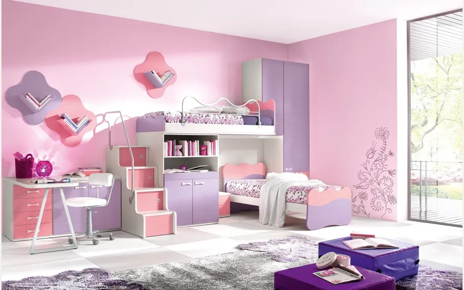 Colori e fantasie femminili per questa cameretta
